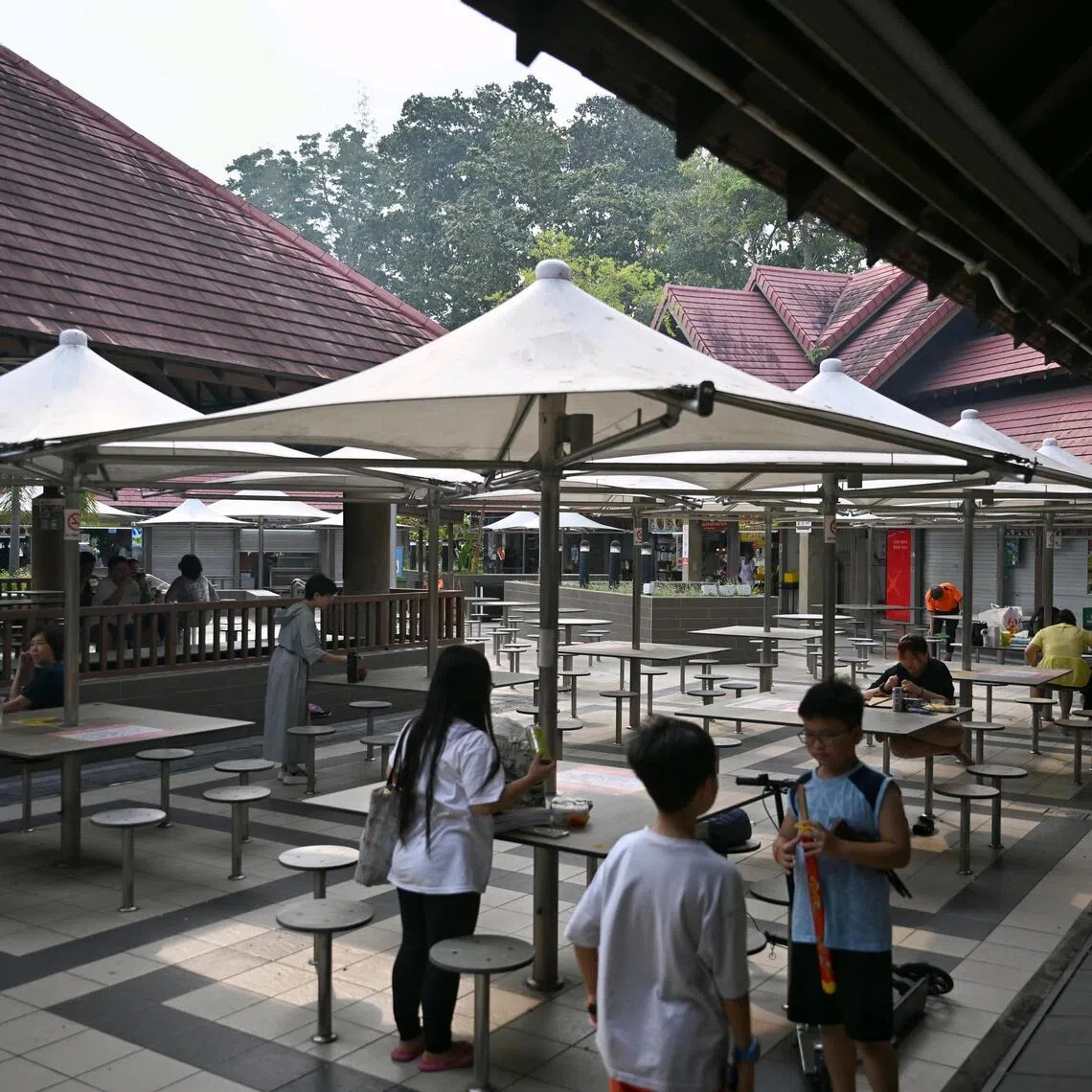 At the East Coast Lagoon Food Village, there were few people queuing for food and several empty tables, a stark contrast to the bustling crowds seen on a typical weekend. 