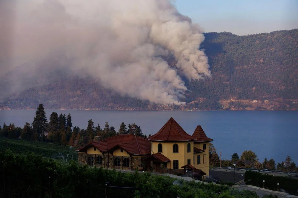 Smoke billowing during the McDougall Creek wildfire in West Kelowna, British Columbia, Canada, on Saturday. 
