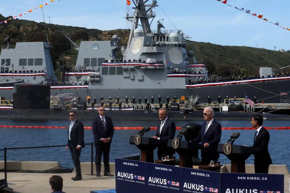 FILE PHOTO: U.S. President Joe Biden, Australian Prime Minister Anthony Albanese and British Prime Minister Rishi Sunak deliver remarks on the Australia - United Kingdom - U.S. (AUKUS) partnership, after a trilateral meeting, at Naval Base Point Loma in San Diego, California U.S. March 13, 2023. REUTERS/Leah Millis/File Photo