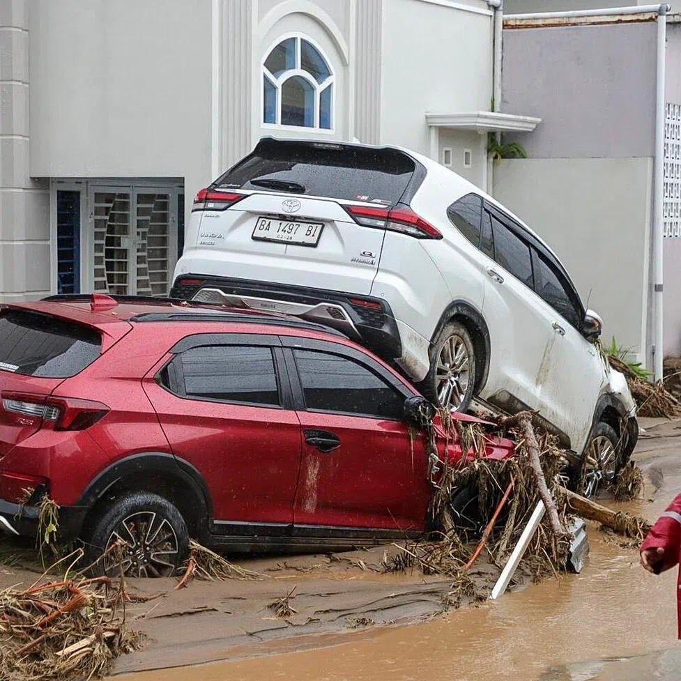 A man inspecting damages at a flood-affected area in Padang, West Sumatra, Indonesia, on Nov 27, 2025.The state administrative court received the lawsuit documents on May 7, the court’s website showed.