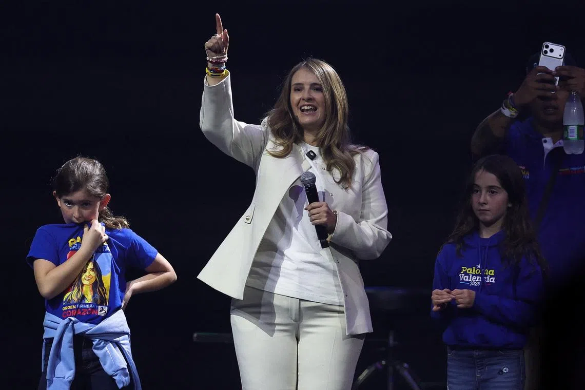 Democratic Centre party presidential candidate Paloma Valencia speaks on stage with her daughters during her campaign closing event in Bogota, Colombia, May 24, 2026. REUTERS/Luisa Gonzalez