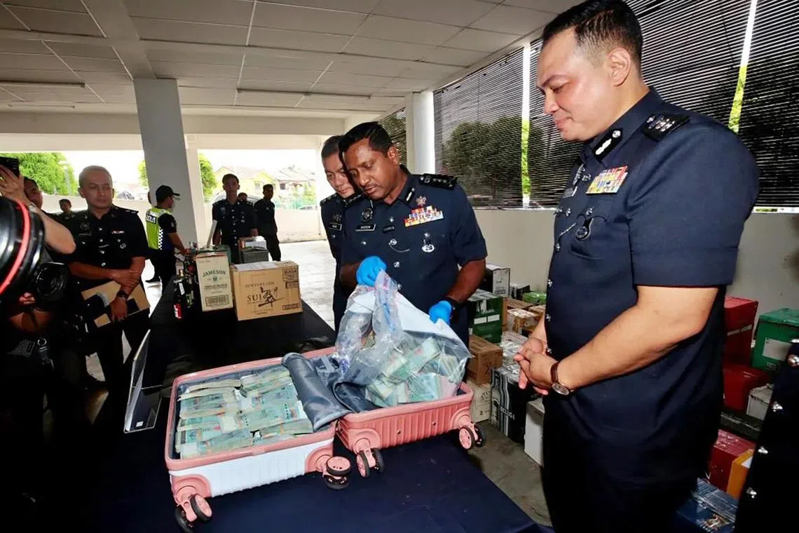 Selangor police chief Datuk Hussein Omar Khan (centre) said the police have identified seven sets of fingerprints on the bag.