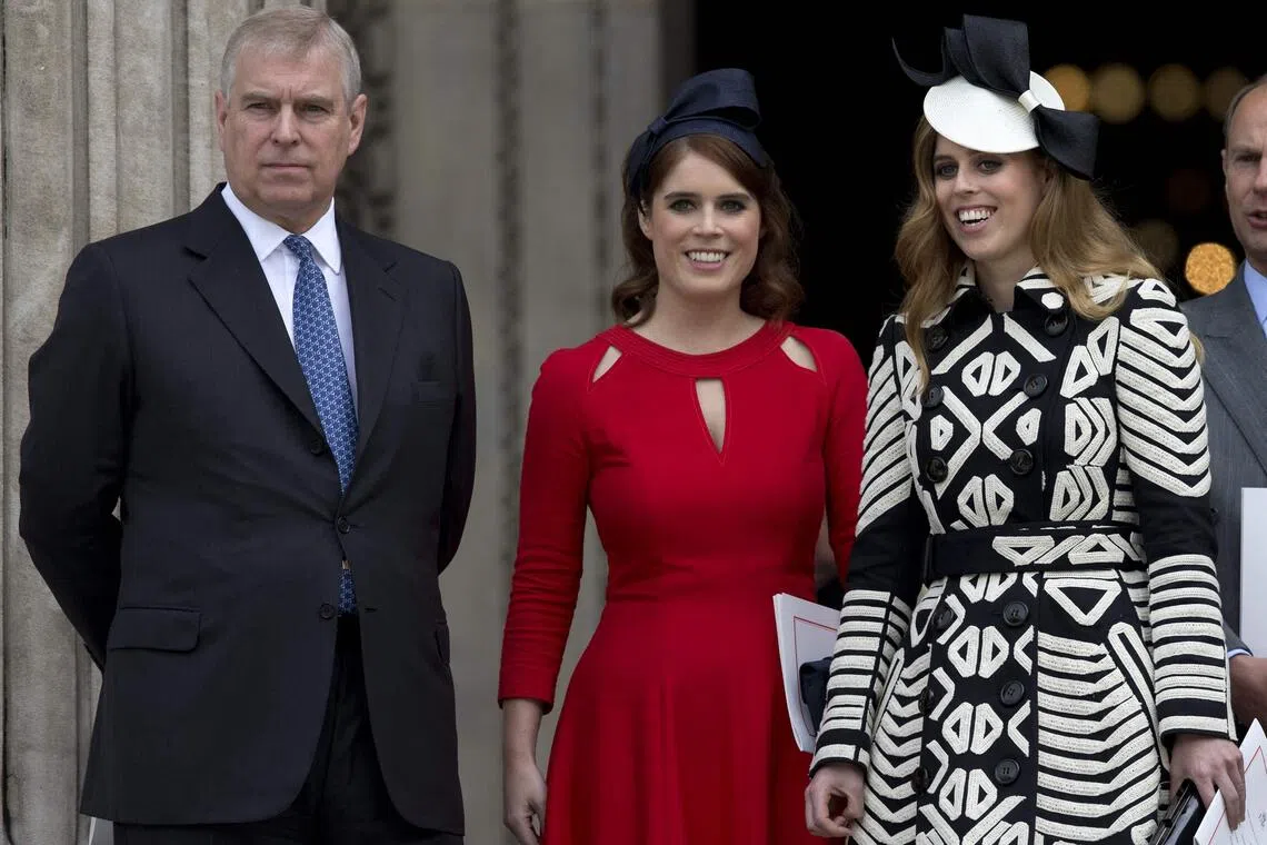 Britain's Prince Andrew (L), Britain's Princess Eugenie of York (2nd L), Britain's Princess Beatrice of York (R) leave after attending a national service of thanksgiving for the 90th birthday of Britain's Queen Elizabeth II in 2016.