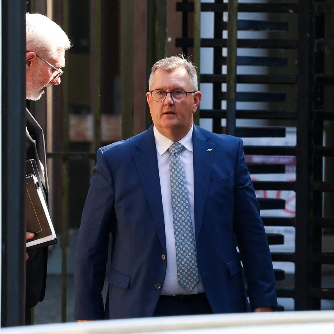 Jeffrey Donaldson, former leader of the Democratic Unionist Party (DUP), charged with historical sex offences, leaves the Newry Courthouse where he appeared for trial, in Newry, Northern Ireland, May 27, 2026. REUTERS/Cathal McNaughton
