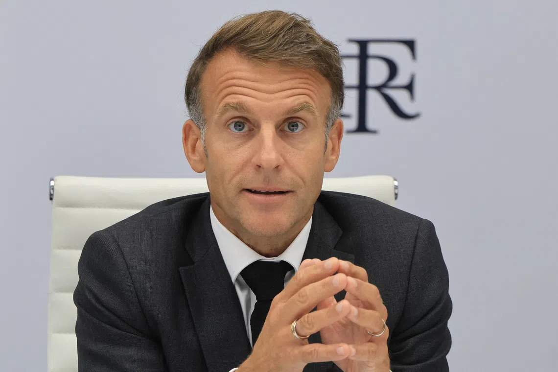 FILE PHOTO: French President Emmanuel Macron speaks following a video conference with G7 leaders at the Elysee Palace in Paris, France on October 2, 2026.      LUDOVIC MARIN/Pool via REUTERS/File Photo