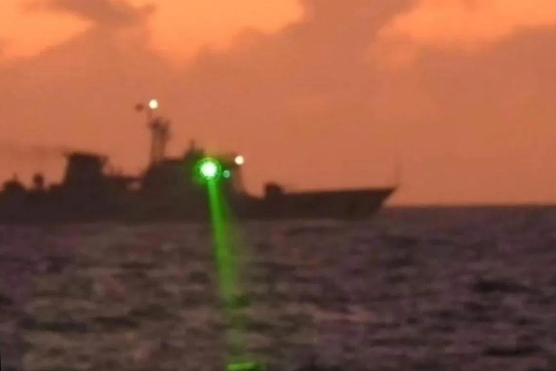 The Philippine Coast Guard has accused a Chinese vessel of shining a "military-grade laser light" at one of its boats.