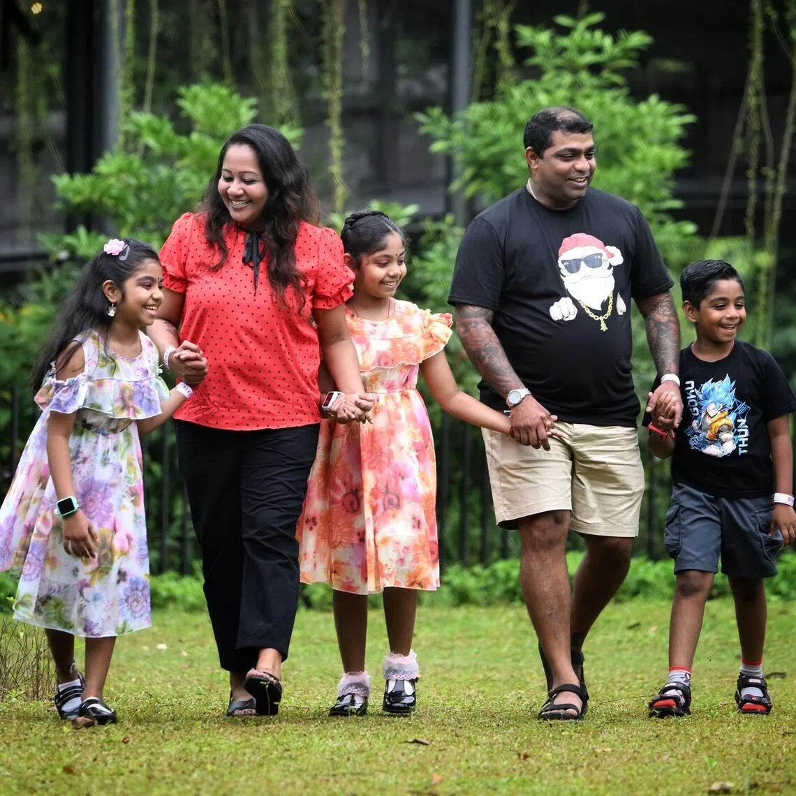 Beneficiaries Sivamaran Darmarajan, 41 and his wife, Marthiana Sarip, 41 with their children ( from left) Shivana Sivamaran, 10, Shivani Sivamaran,9 and Shakti Sivamaran, 6 at Sinda?s Back To School Festival on Nov 23, 2025.