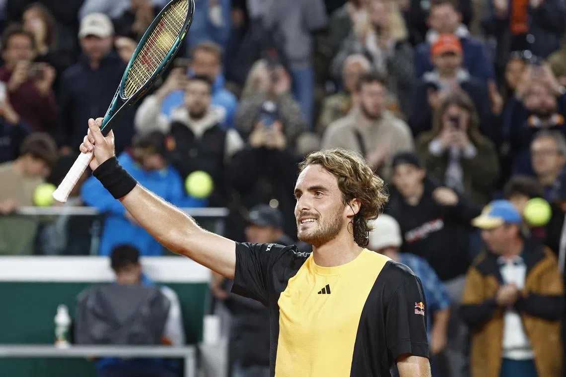 Greece's Stefanos Tsitsipas celebrating his win against Zhizhen Zhang of China, on May 31.