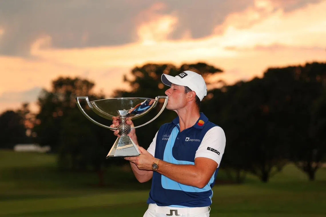 Viktor Hovland of Norway celebrating after winning the FedEx Cup at East Lake Golf Club in Atlanta, Georgia.  