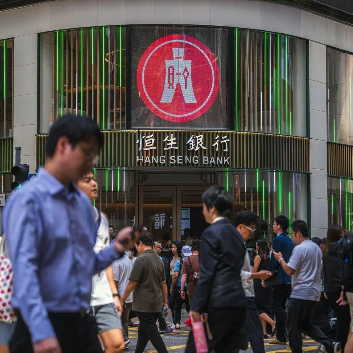 HSBC has vowed to invest billions of dollars over the next few years and not conduct any layoffs as part of its proposed deal to take Hang Seng Bank private.