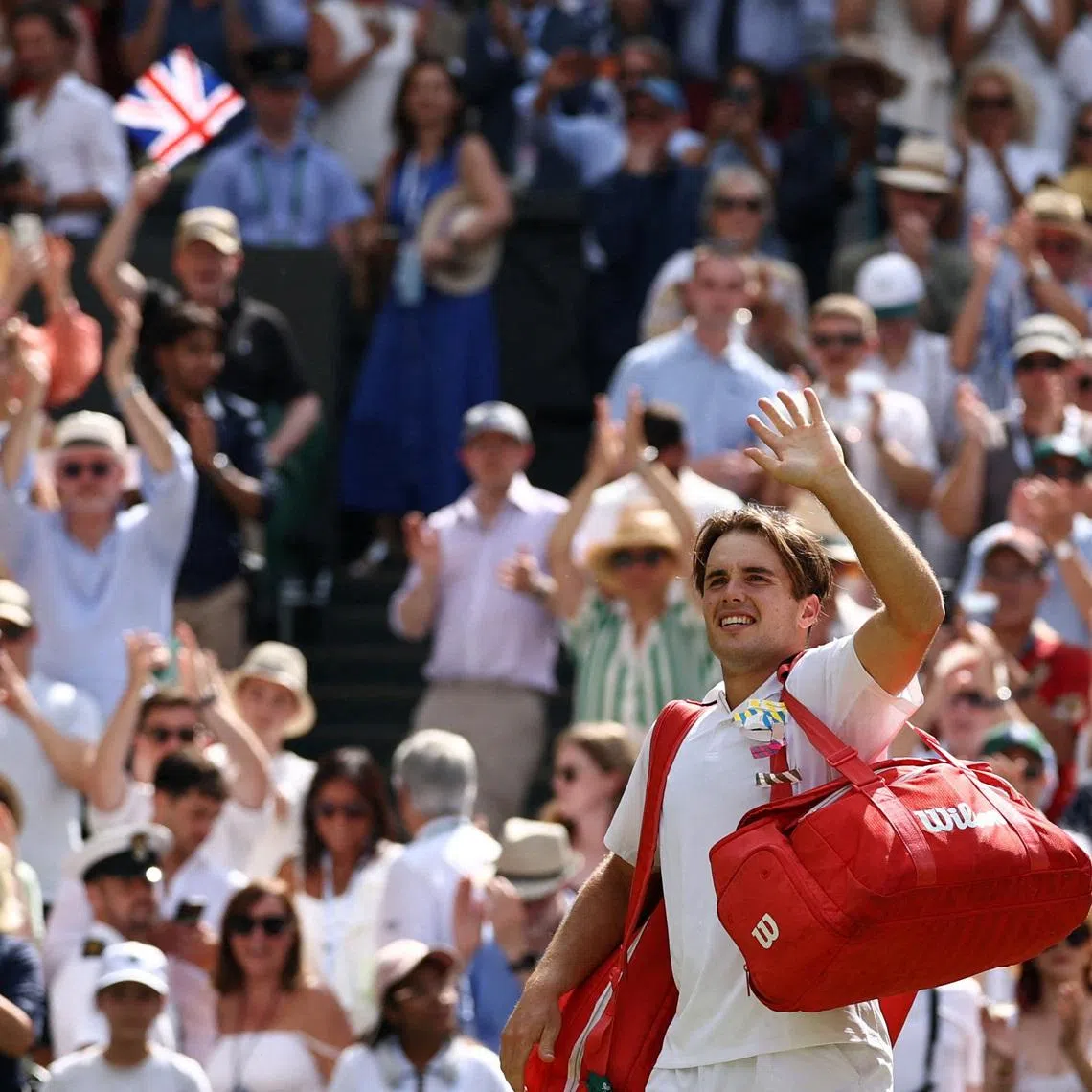 Tennis - Wimbledon - All England Lawn Tennis and Croquet Club, London, Britain - July 10, 2026 Britain's Arthur Fery waves to spectators as he leaves the court after losing his semi final match against Germany's Alexander Zverev REUTERS/Toby Melville