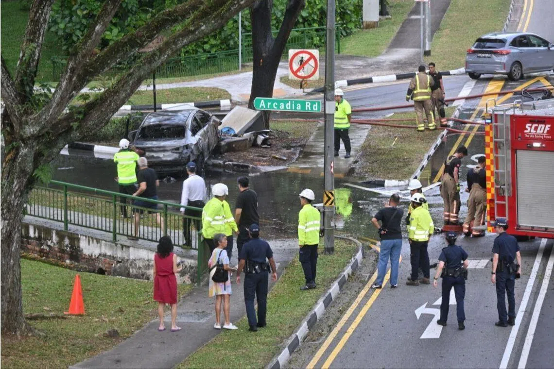 2 taken to hospital after car skids in Adam Road, crashes into gas equipment and catches fire
