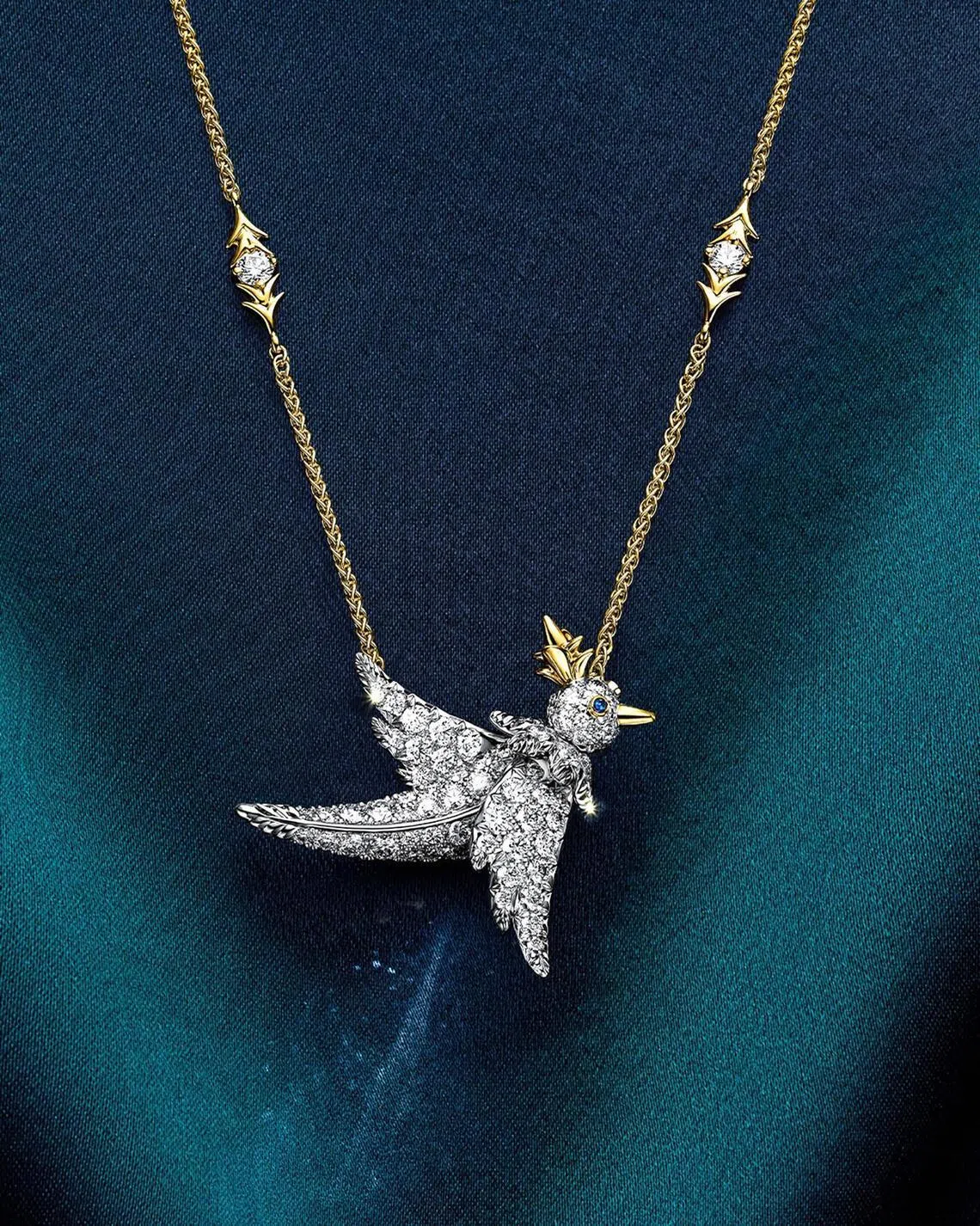 Bird on a Rock by Tiffany bird pendant in platinum and 18k yellow gold with diamonds.