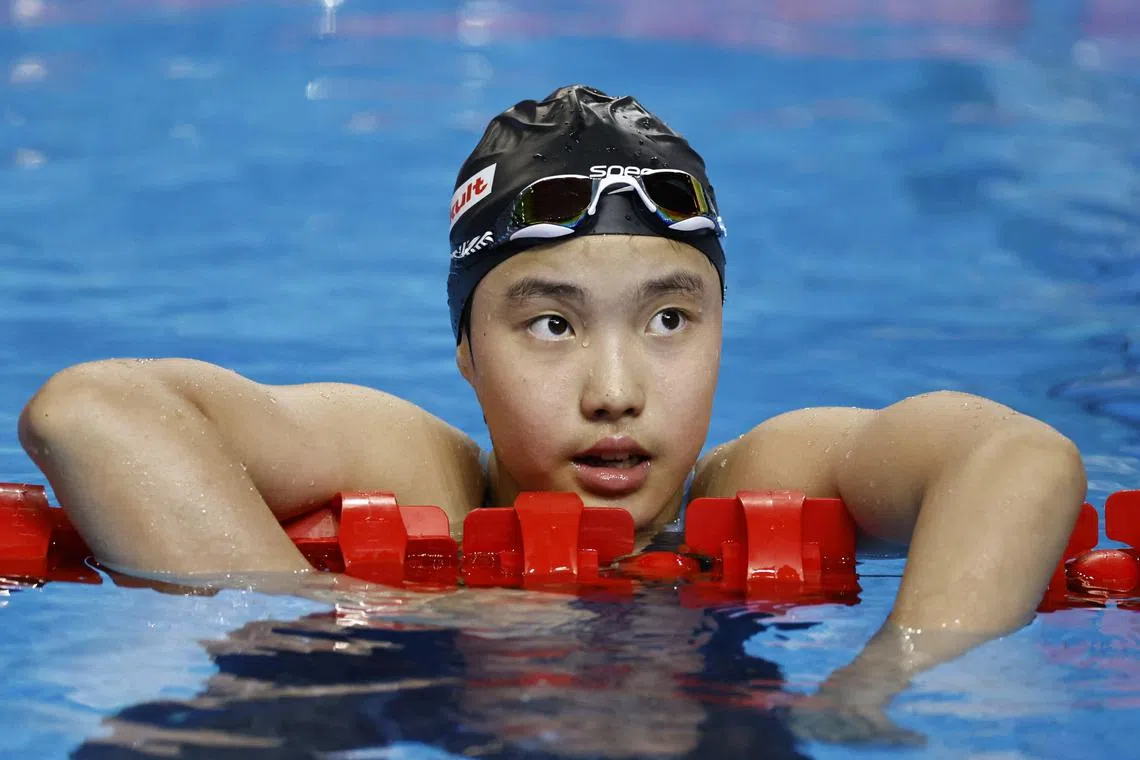 FILE PHOTO: Swimming - World Aquatics Championships - Women 400m Medley - World Aquatics Championships Arena, Singapore - August 3, 2025 China's Zidi Yu reacts at the end of heat 2 REUTERS/Tingshu Wang/File Photo