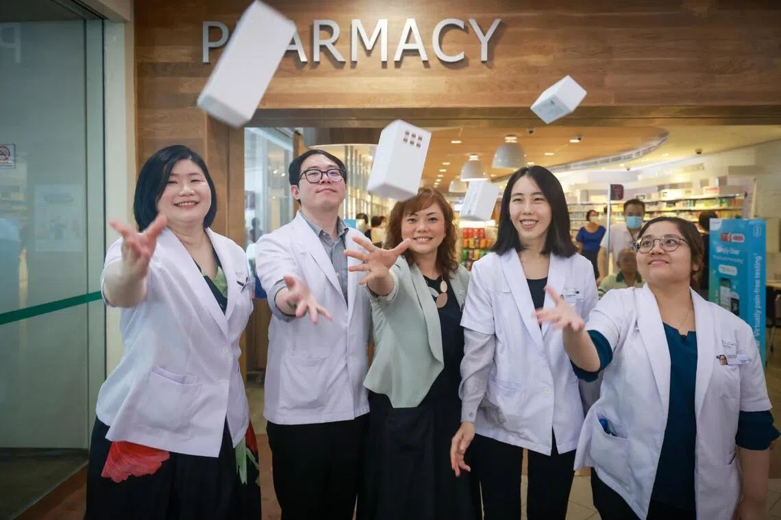 (From left) Pharmacy Practice Head Chong Yi San, Pharmacy Technician Executive Ooi Kit Siang, Pharmacy Director Lim Hong Yee, Senior Pharmacist Alicia Lin and Senior Pharmacy Technician Debbie Cheng designed the single-material paper medication box.