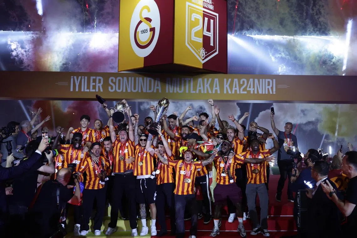 Galatasaray players celebrating in Istanbul on May 27, 2024, after winning the Turkish Super League for the 24th time and with a  record 102 points.
