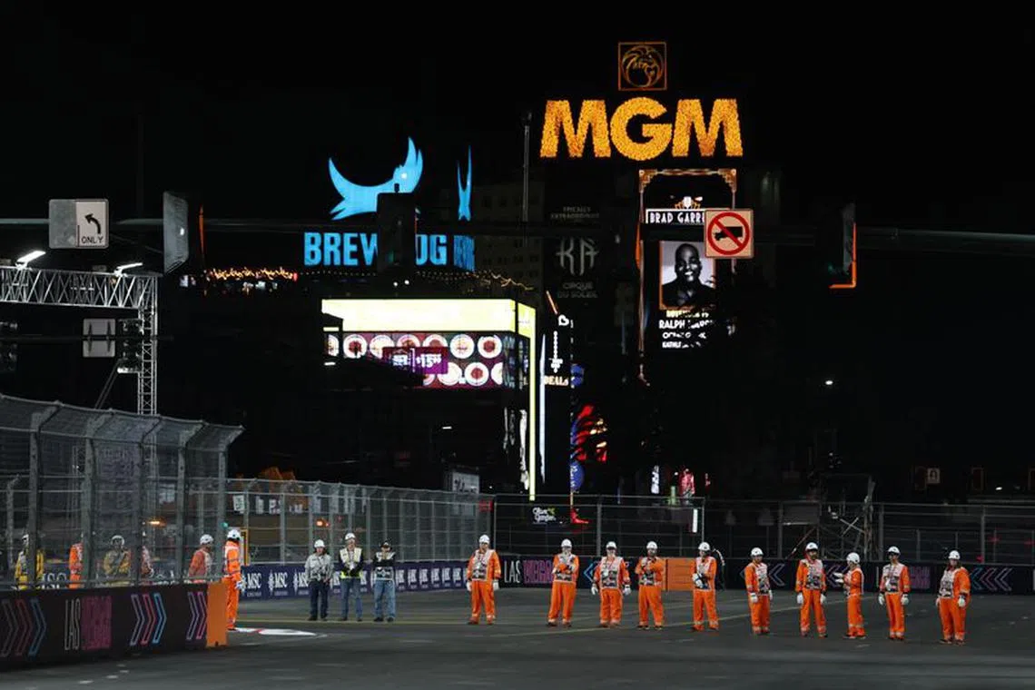 Formula One F1 - Las Vegas Grand Prix - Las Vegas Strip Circuit, Las Vegas, Nevada, U.S - November 17, 2023 Safety workers on the track ahead of practice REUTERS/Mike Blake