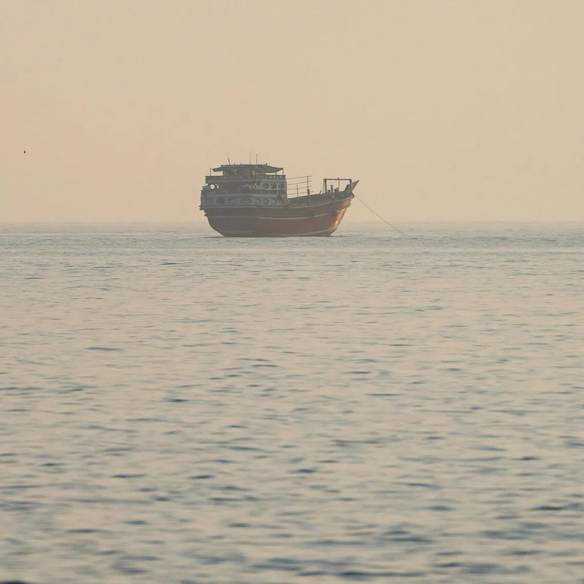 A vessel at the Strait of Hormuz, as seen from Musandam, Oman, July 28.