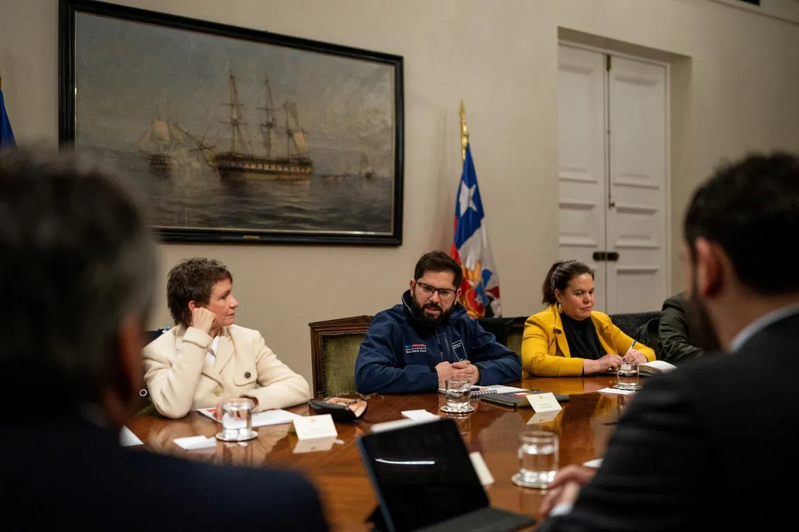 Chile's President Gabriel Boric along with Defense Minister Maya Fernandez and Interior Minister Carolina Toha meet during a 'Pro Security Cabinet' at La Moneda government palace in Santiago, Chile, July 18, 2024. Marcelo Segura/Chilean Presidency/Handout via REUTERS