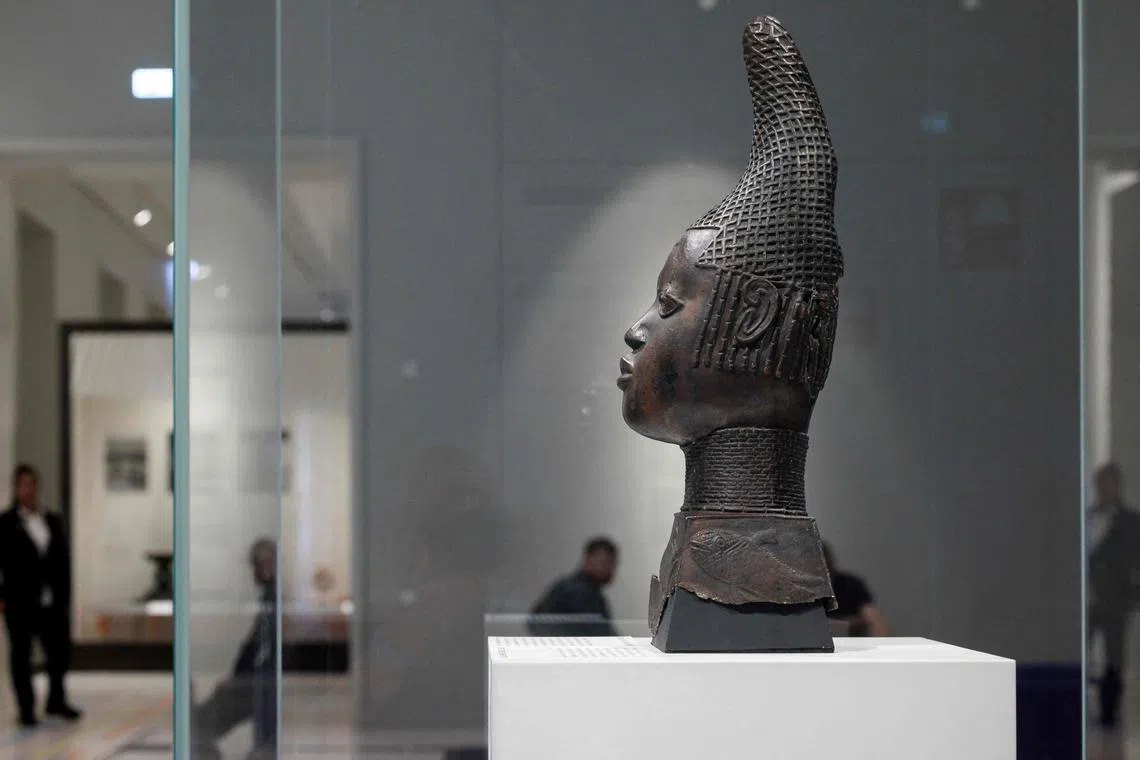 One of the Benin Bronzes is pictured in a file photo during a press preview in September at the new Humboldt Forum in Berlin. 