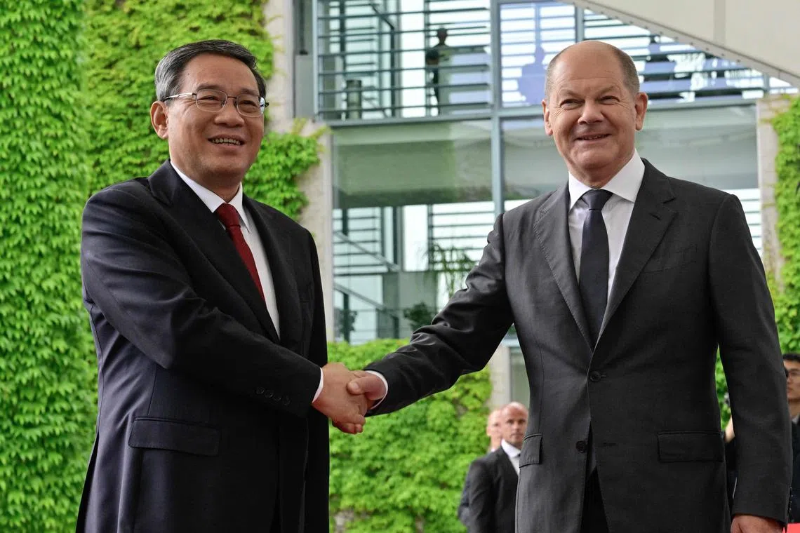 Chinese Premier Li Qiang (left) meeting German Chancellor Olaf Scholz in Berlin on June 20.