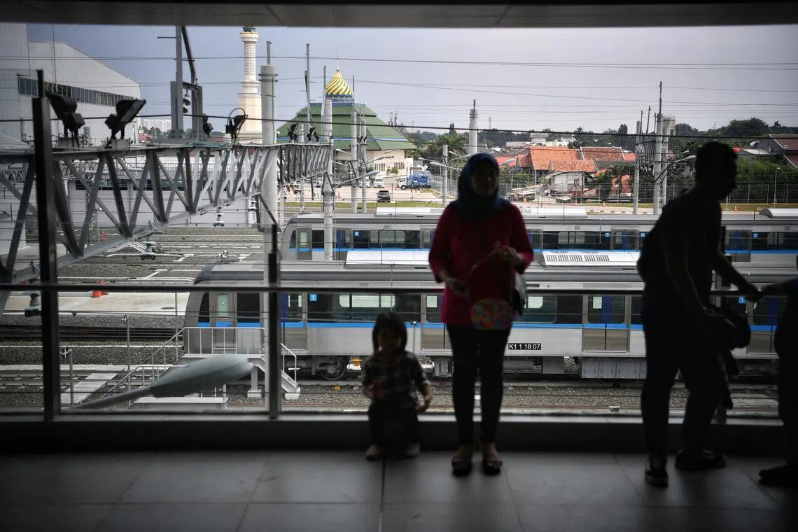 Commuters at Lebak Bulus MRT Station, on the North-South line of Jakarta MRT. 