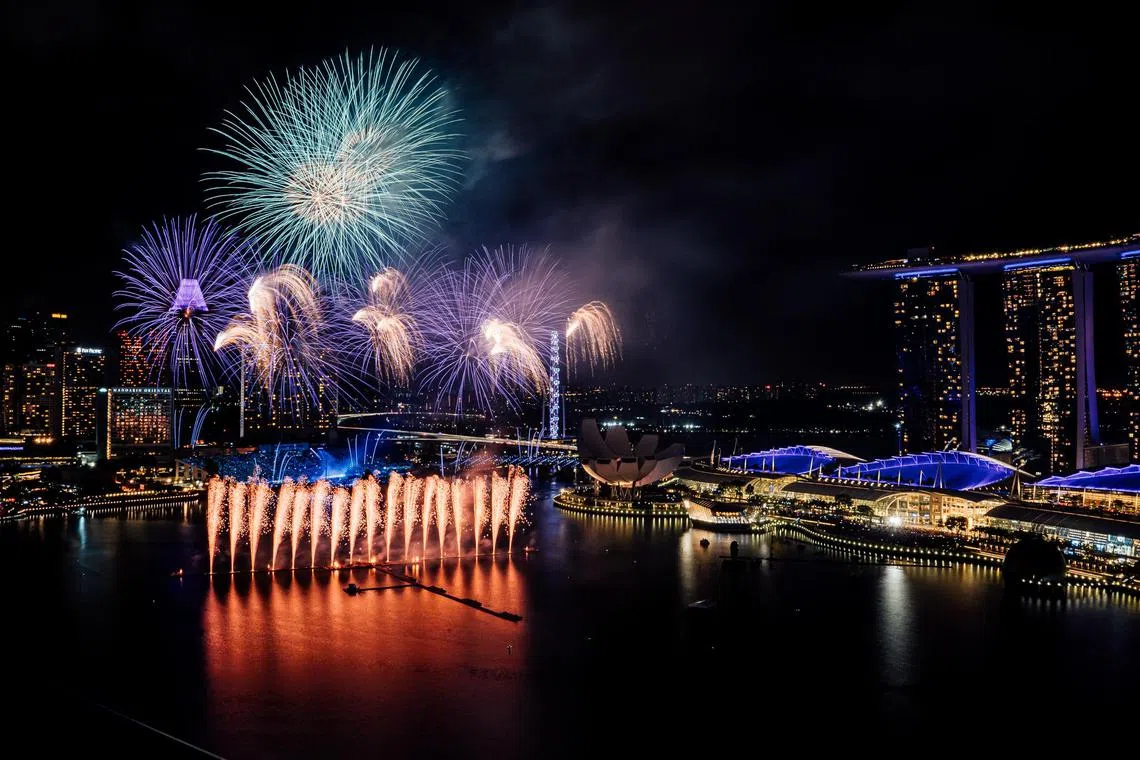 Dazzling fireworks lighting up the Marina Bay skyline during the Marina Bay Singapore Countdown 2020.
