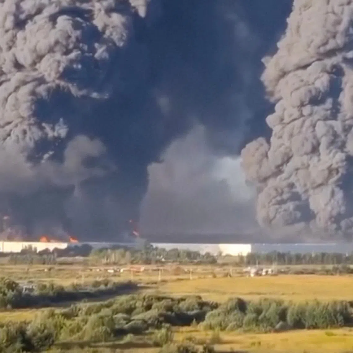 Smoke billows from a warehouse, after deadly Ukrainian drone attacks, as per regional governors, in Elektrostal, Moscow Region, Russia, July 18, 2026, in this screen grab obtained from a social media video. Social Media/via REUTERS
