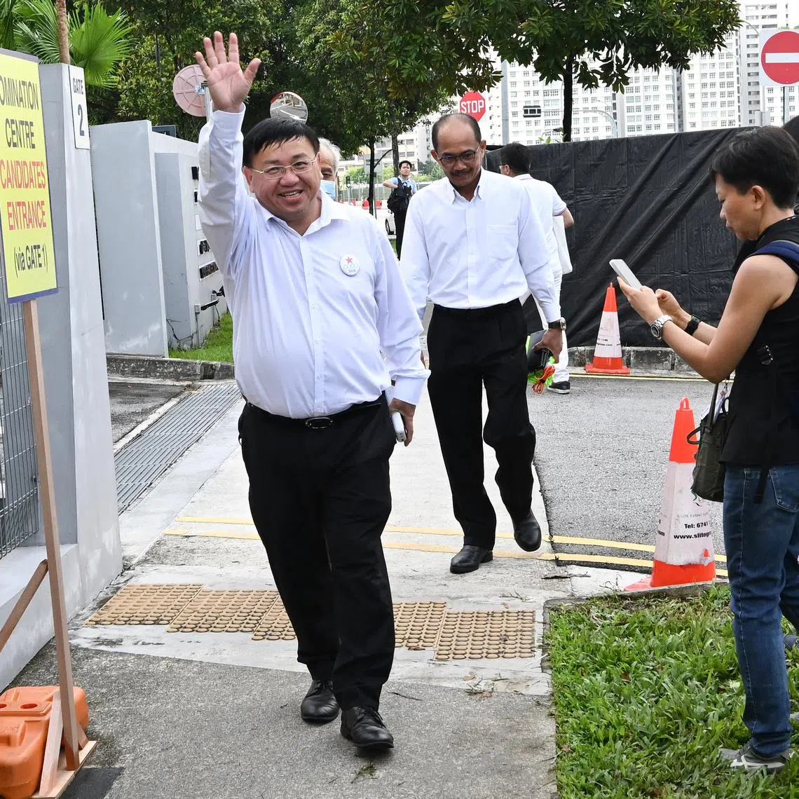 SDA chief Desmond Lim arriving at the Yusof Ishak Secondary School nomination centre on April 23.