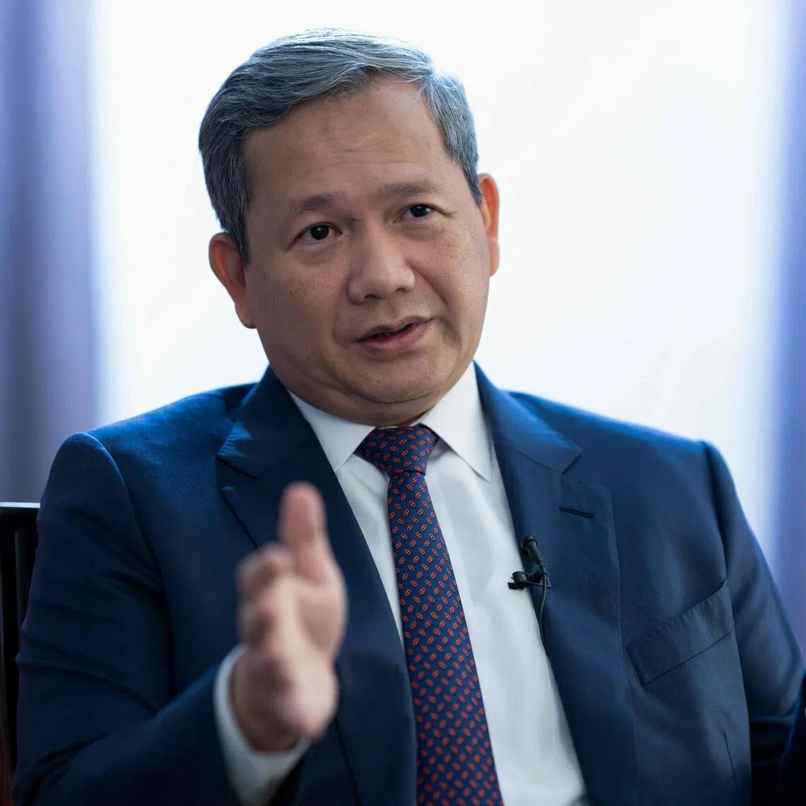 Cambodian Prime Minister Hun Manet speaks during an interview with AFP in Brussels on February 25, 2026. Cambodia's Prime Minister Hun Manet told AFP that scam centres were destroying his country's economy giving the nation a bad name -- pushing back on allegations of government connivance. The nation has emerged as a hotspot for crime syndicates running a multibillion-dollar fraud industry that sees scammers lure internet users globally into fake romantic relationships and cryptocurrency investments. (Photo by JOHN THYS / AFP)