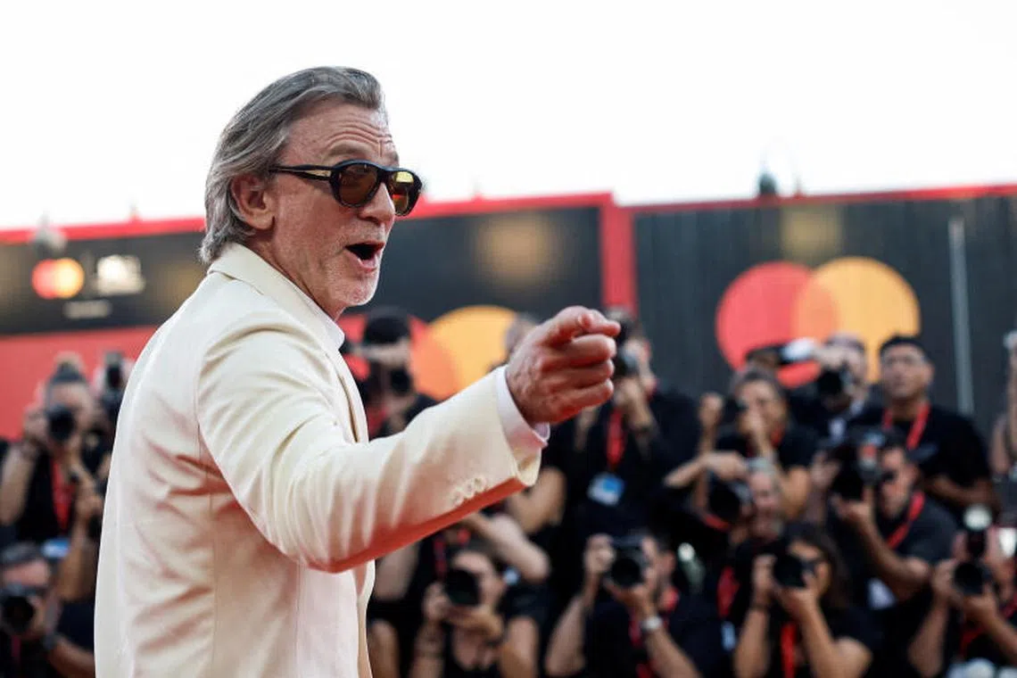 English actor Daniel Craig poses on the red carpet during arrivals for the screening of the movie Queer, in competition, at the 81st Venice Film Festival in Venice, Italy, on  Sept 3, 2024.