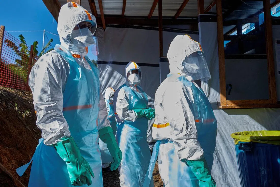 Congo says Ebola deaths top 100 as armed groups th