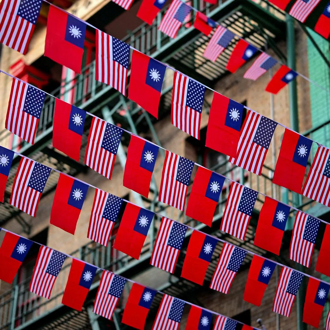 FILE PHOTO: U.S. and Taiwanese flags are seen in San Francisco, California, January 28, 2026. REUTERS/Stephen Nellis/File Photo/File Photo