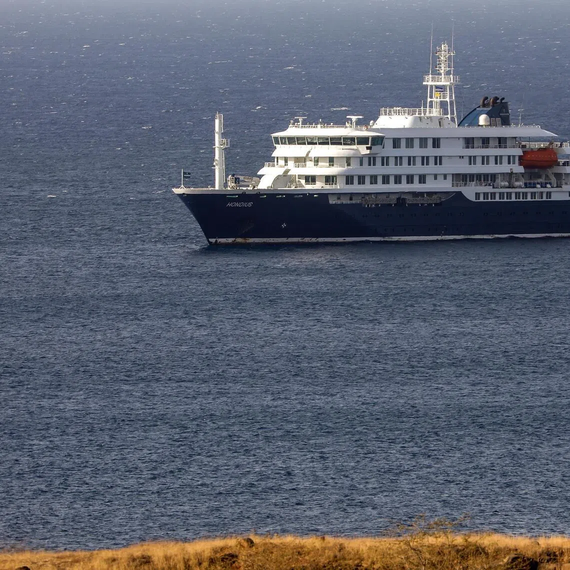 Dutch cruise ship MV Hondius is anchored off the coast of the city of Praia on the island of Santiago, Cape Verde, on May 4, after three people died onboard from an acute respiratory syndrome. 