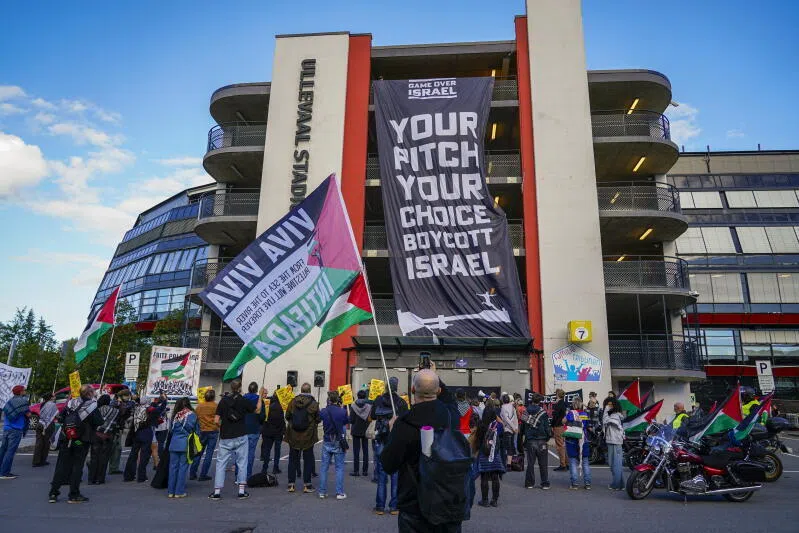 Members and supporters of Action Group for Palestine protest in solidarity for Palestinians outside Ullevaal Stadium in Oslo, Norway, on Sept 17.