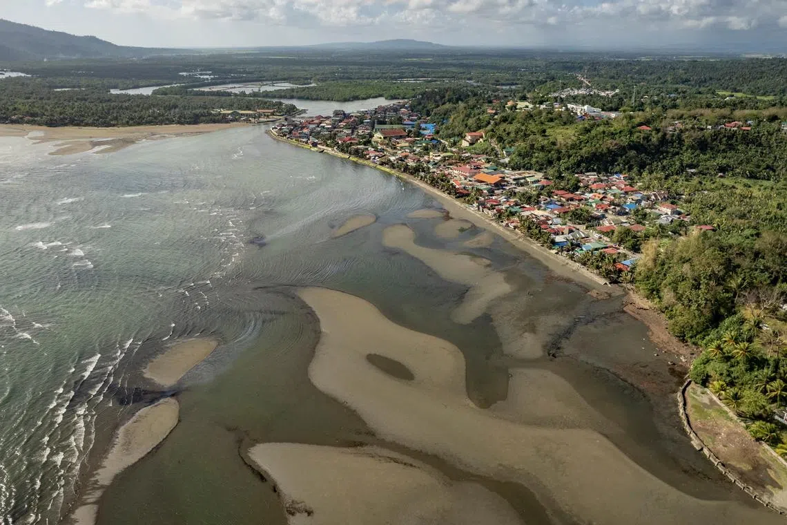 An aerial view shows the oil spill from the sunken fuel tanker MT Princess Empress on the shores of Pola in Philippines, on March 8.