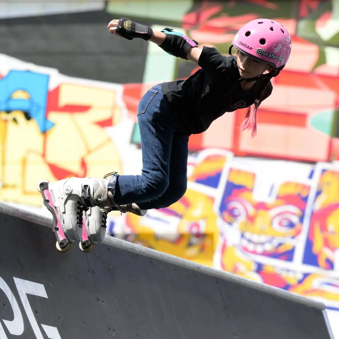 Eight years old Chloe Chua, an inline skater at Festival International des Sports Extr?mes (FISE) at *SCAPE on Nov 23, 2025.