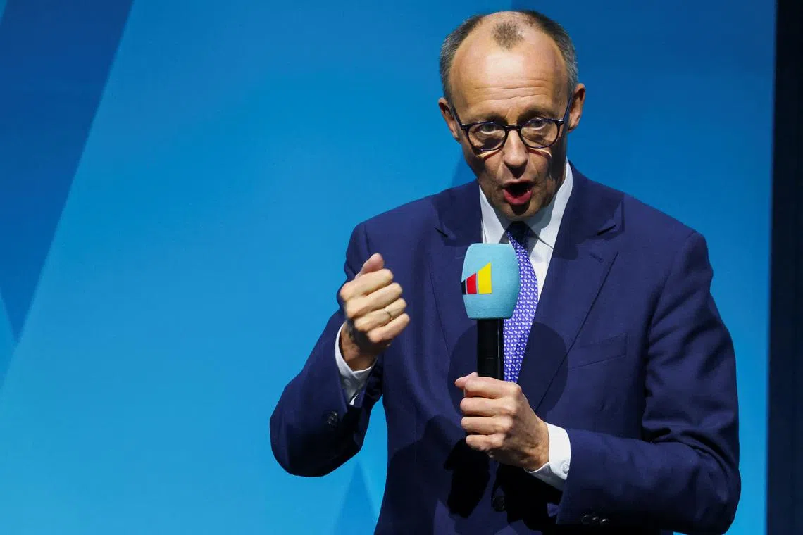 German conservative CDU candidate for chancellor Friedrich Merz campaigns in Berlin, Germany, February 20, 2025. REUTERS/Christian Mang