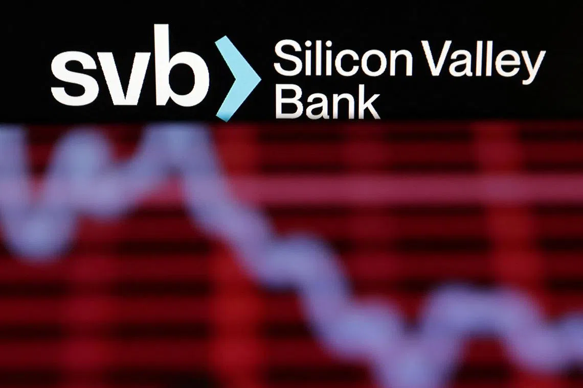 SVB (Silicon Valley Bank) logo and decreasing stock graph are seen in this illustration taken March 19, 2023. REUTERS/Dado Ruvic/Illustration