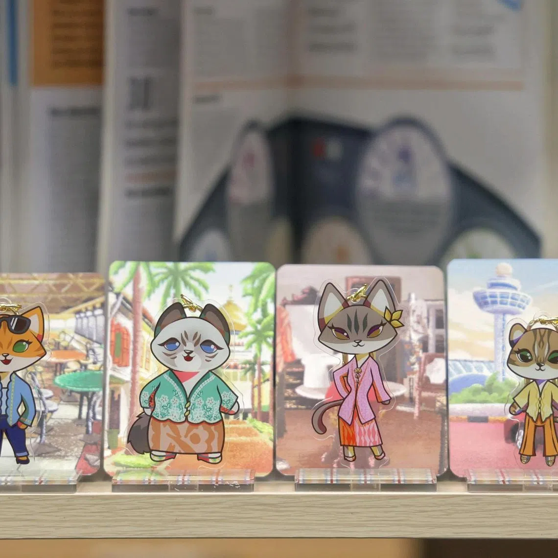 Kebaya-inspired keychains made by Nanyang Polytechnic School of Design and Media Year 3 visual communication students Giselle Chionh, 19, Kirsten Discaya, 19, Seng Le Tong, 20, and Nicole Lee, 20, as seen on Dec 3, 2024.