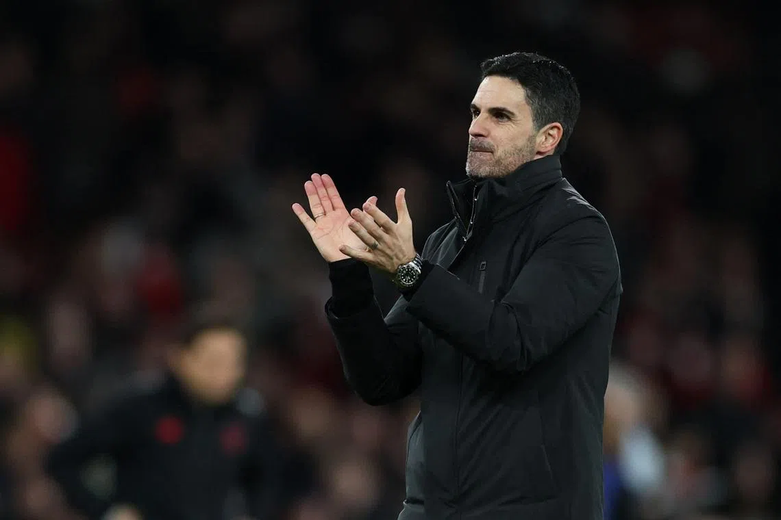 Soccer Football - UEFA Champions League - Round 16 - Second Leg - Arsenal v Bayer Leverkusen - Emirates Stadium, London, Britain - March 17, 2026 Arsenal manager Mikel Arteta applauds fans after the match Action Images via Reuters/Andrew Boyers