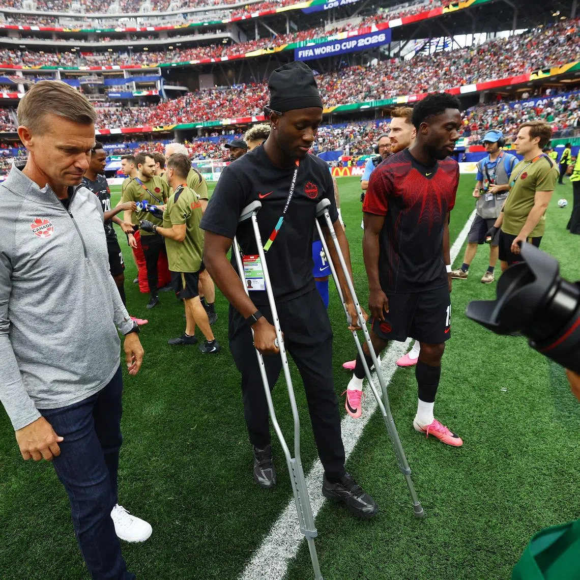 Soccer Football - FIFA World Cup 2026 - Round of 32 - South Africa v Canada - Los Angeles Stadium, Inglewood, California, U.S. - June 28, 2026 Canada's Ismael Kone walks on the pitch on crutches before the match REUTERS/Matthew Childs