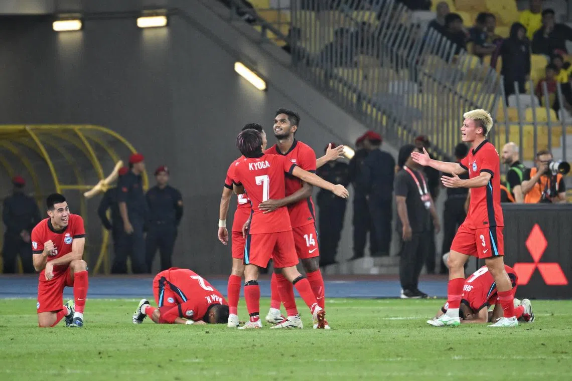 Singapore players celebrating after drawing 0-0 to Malaysia and going through to the semi finals of the AFF Asean Championship at Bukit Jalil Stadium on Dec 20, 2024.