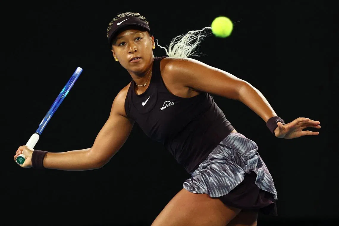 Tennis - Australian Open - Melbourne Park, Melbourne, Australia - January 13, 2025 Japan's Naomi Osaka in action during her first round match against France's Caroline Garcia REUTERS/Edgar Su/ File Photo