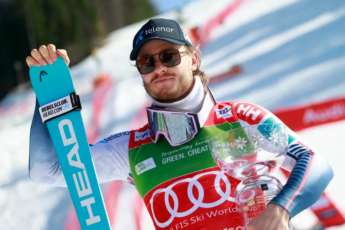 Alpine Skiing - FIS Alpine Ski World Cup - Men's Slalom - Kranjska Gora, Slovenia - March 8, 2026 Norway's Atle Lie McGrath celebrates with a trophy after winning the Men's Slalom REUTERS/Borut Zivulovic