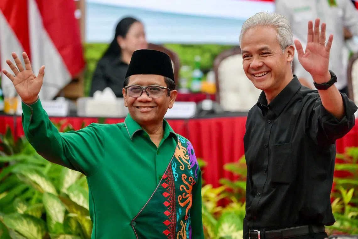Indonesia’s security minister Mahfud MD (left) has been appointed as the running mate for Mr Ganjar Pranowo, the presidential candidate for the ruling Indonesian Democratic Party of Struggle (PDI-P).
