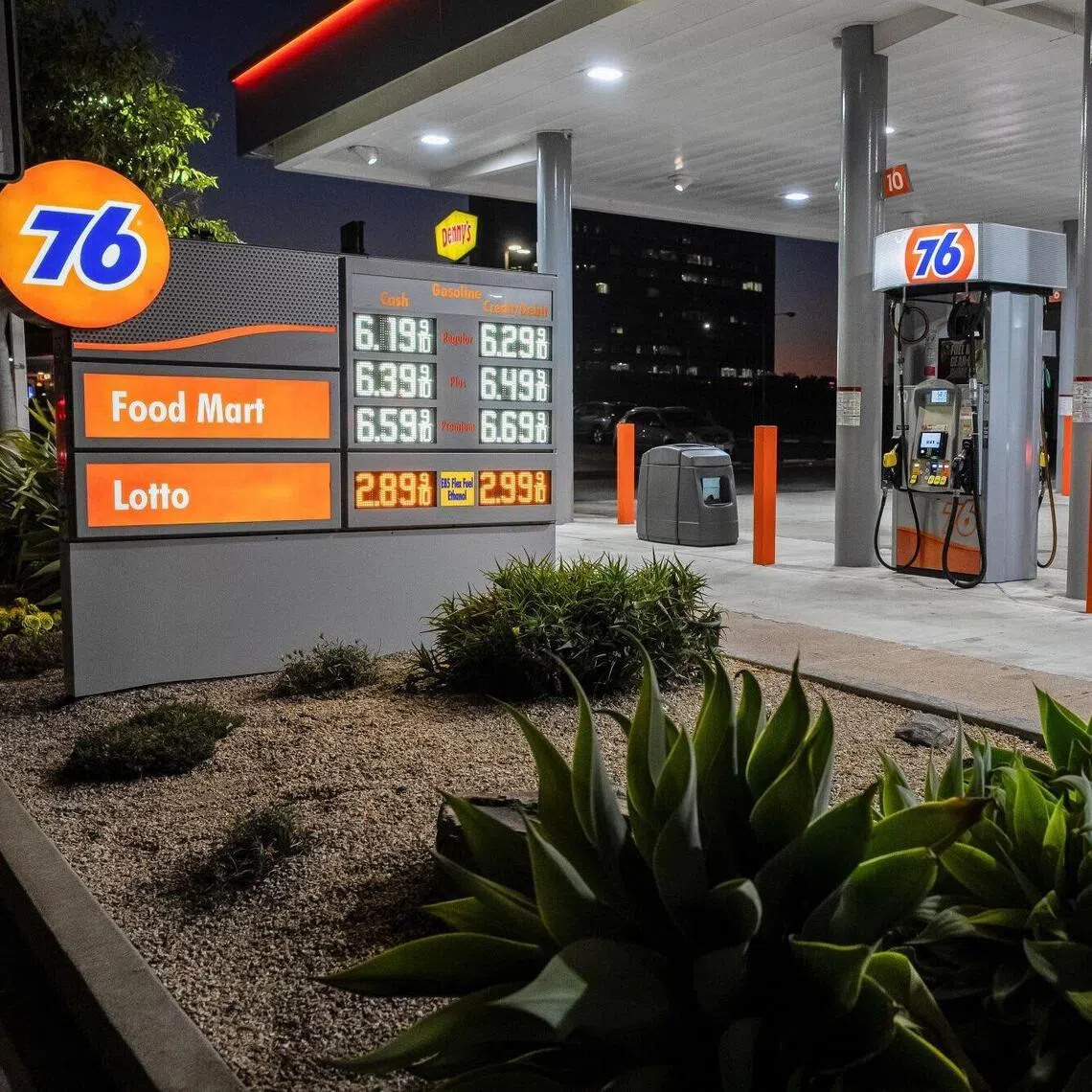 Petrol prices above US$6 a gallon at a gas station in Emeryville, California on Oct 12.