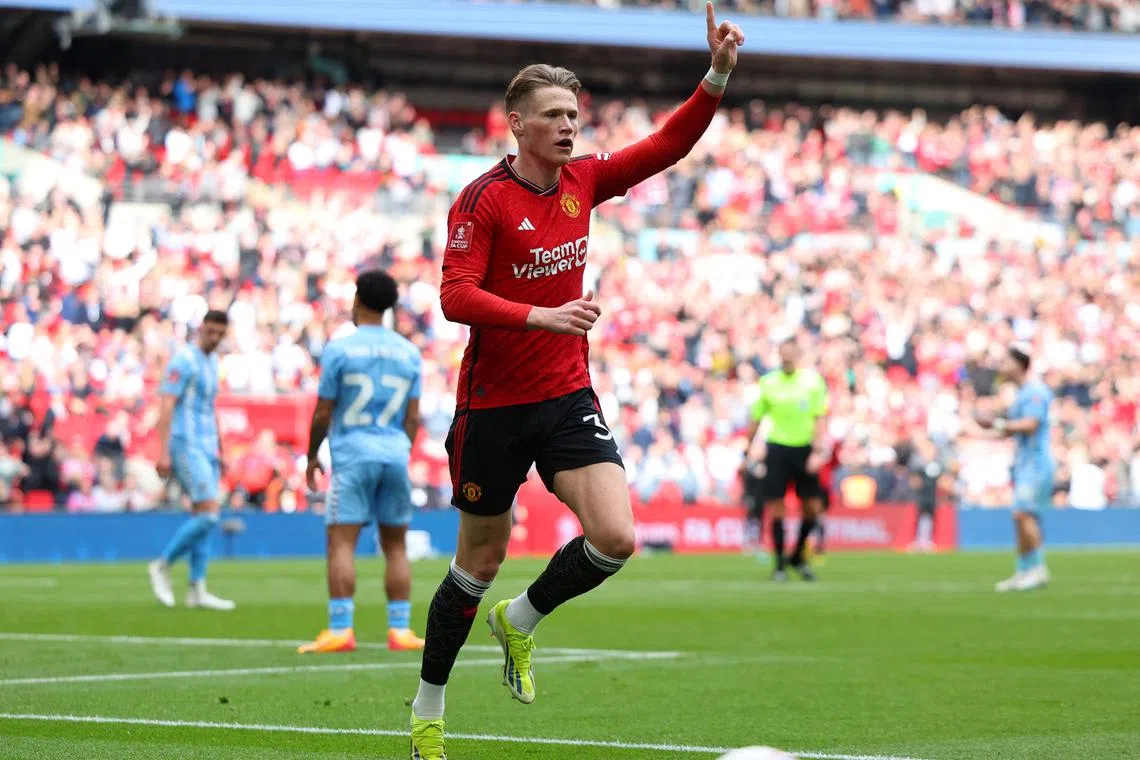 FILE PHOTO: Soccer Football - FA Cup - Semi Final - Coventry City v Manchester United - Wembley Stadium, London, Britain - April 21, 2024 Manchester United's Scott McTominay celebrates scoring their first goal REUTERS/Toby Melville/File Photo