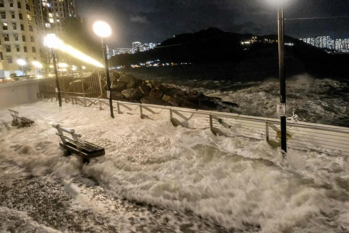 Waves crash into the Heng Fa Chuen residential district as Super Typhoon Ragasa approaches near Hong Kong on September 23, 2025. Hong Kong and parts of southern China ground to a halt on the evening of September 23 as Super Typhoon Ragasa approached with high winds and lashing rain, forcing Chinese authorities to shut down schools and businesses in at least 10 cities. (Photo by Tommy WANG / AFP)