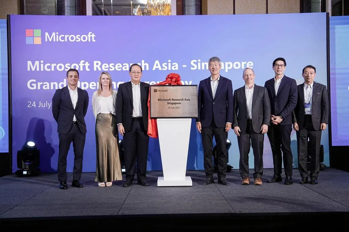 Manpower Minister Tan See Leng (third from left) and Microsoft Research president Peter Lee (fourth from right) at the launch of the lab on July 24.